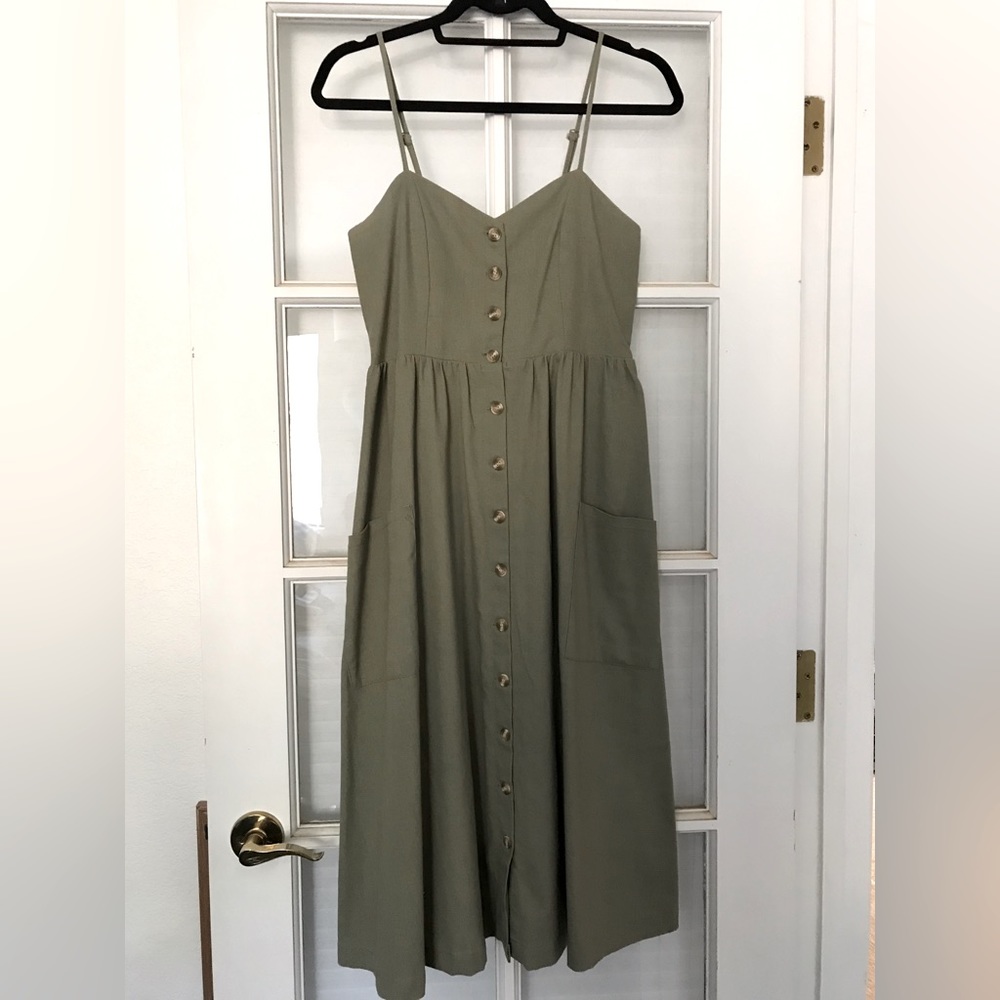 Hem and Thread Green Dress with pockets